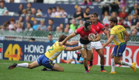 Hong Kong Men's Rugby Sevens Team in action at Hong Kong Stadium in 2015 Cathay Pacific / HSBC Hong Kong Sevens.