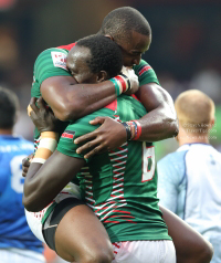 Two Kenya Rugby Sevens players celebrating after scoring a try.