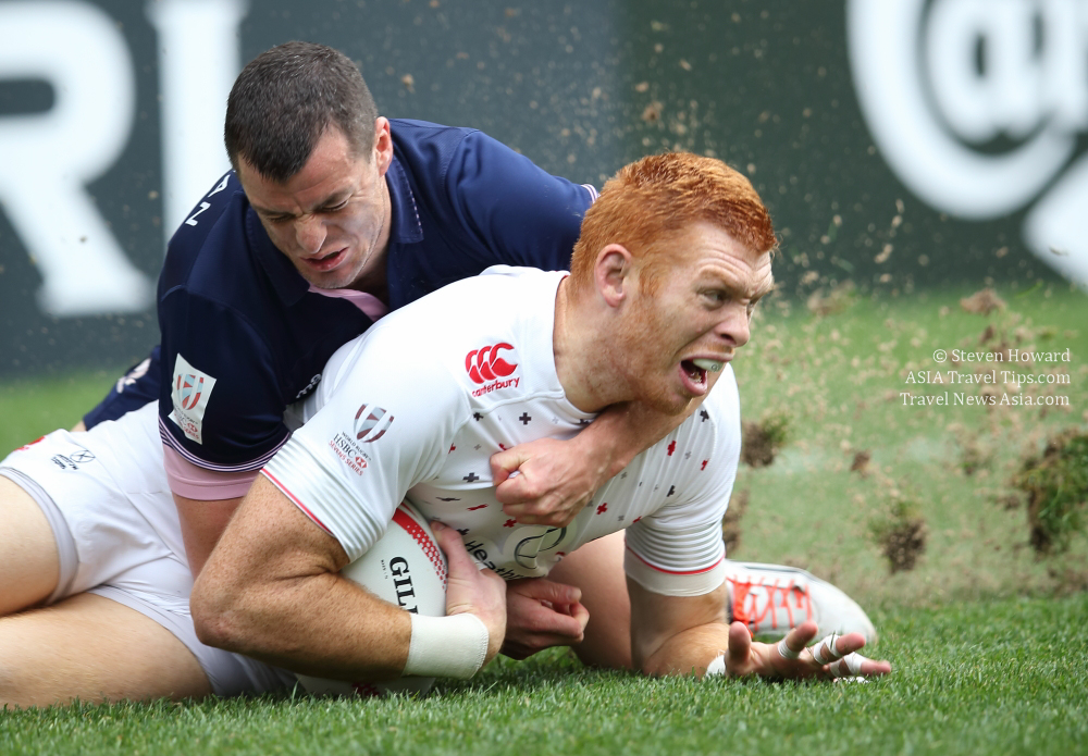 England's James Rodwell scores a try at the Cathay Pacific / HSBC Hong Kong Sevens in 2016. Rodwell has now eclipsed Kiwi DJ Forbes' record for the most appearances ever on the HSBC World Rugby Sevens Series. Picture by Steven Howard of TravelNewsAsia.com Click to enlarge.