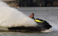 Having fun on a jet ski on Chaoprhaya River in Bangkok, Thailand. More at: https://www.asiatraveltips.com/PicturesofJetSkiBangkok2013.shtml