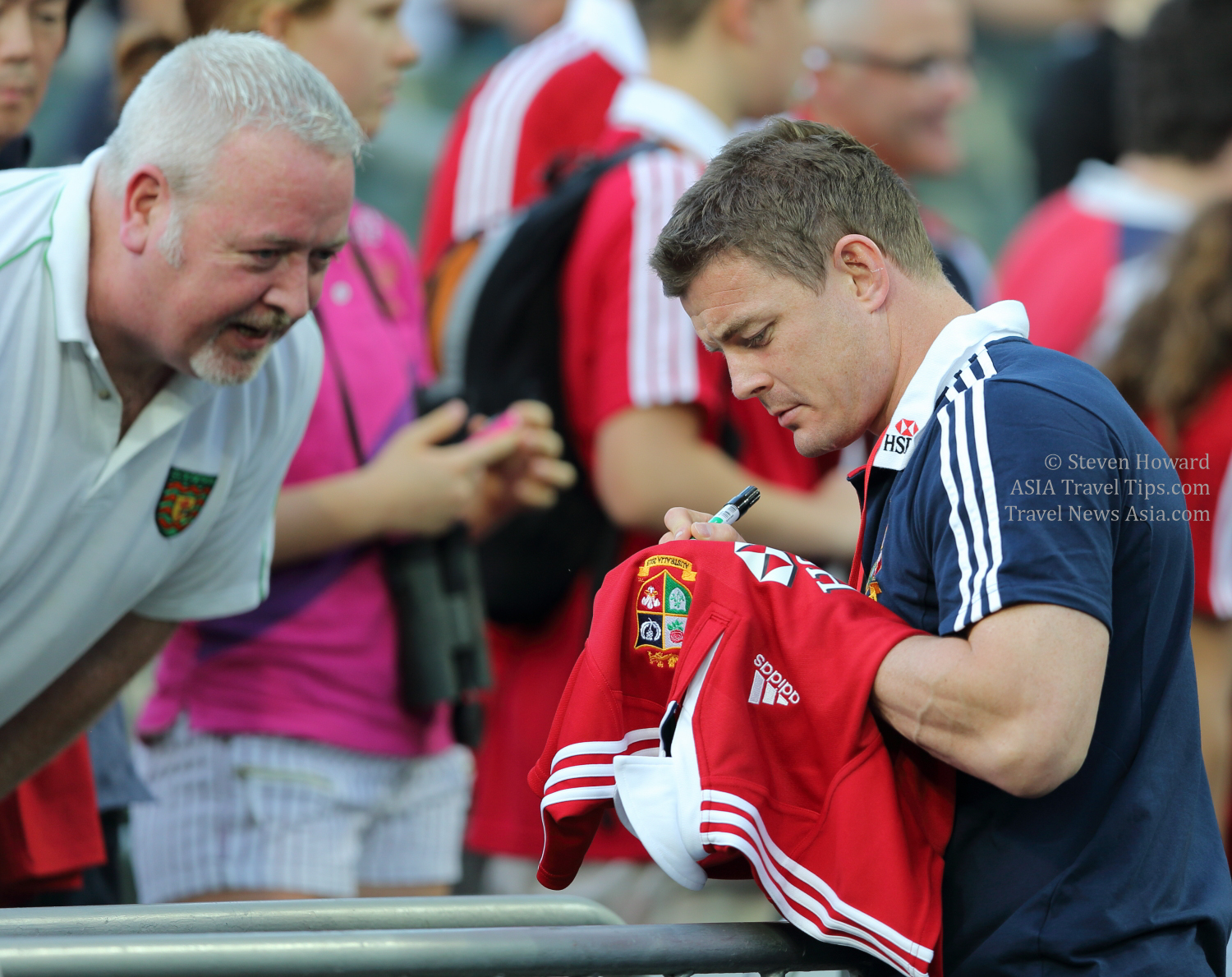 Brian O'Driscoll, one of the most highly respected and famous rugby players in the world, signing a shirt for a British & Irish Lions fan in Hong Kong in 2013. Picture by Steven Howard of TravelNewsAsia.com Click to enlarge.