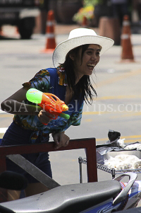 Pictures of Songkran 2012, taken on Friday, 13 April 2012, on Silom Road in Bangkok.