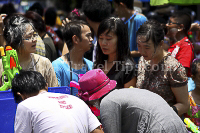 Pictures of Songkran 2012, taken on Friday, 13 April 2012, on Silom Road in Bangkok.