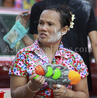 Pictures of Songkran 2012, taken on Friday, 13 April 2012, on Silom Road in Bangkok.