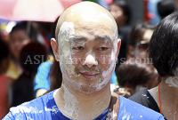 Pictures of Songkran 2012, taken on Friday, 13 April 2012, on Silom Road in Bangkok.