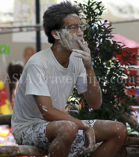 Pictures of Songkran 2012, taken on Friday, 13 April 2012, on Silom Road in Bangkok.