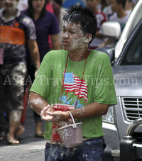 Pictures of Songkran 2012, taken on Friday, 13 April 2012, on Silom Road in Bangkok.