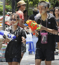 Pictures of Songkran 2012, taken on Friday, 13 April 2012, on Silom Road in Bangkok.