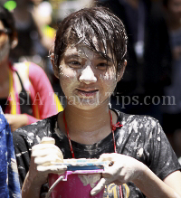 Pictures of Songkran 2012, taken on Friday, 13 April 2012, on Silom Road in Bangkok.