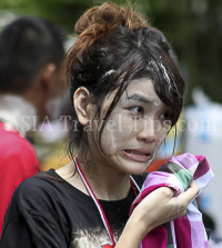 Pictures of Songkran 2012, taken on Friday, 13 April 2012, on Silom Road in Bangkok.