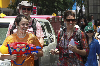 Pictures of Songkran 2012, taken on Friday, 13 April 2012, on Silom Road in Bangkok.