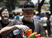 Pictures of Songkran 2012, taken on Friday, 13 April 2012, on Silom Road in Bangkok.