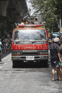 Pictures of Songkran 2012, taken on Friday, 13 April 2012, on Silom Road in Bangkok.