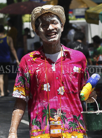 Pictures of Songkran 2012, taken on Friday, 13 April 2012, on Silom Road in Bangkok.