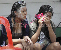 Pictures of Songkran 2012, taken on Friday, 13 April 2012, on Silom Road in Bangkok.