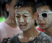 Pictures of Songkran 2012, taken on Friday, 13 April 2012, on Silom Road in Bangkok.