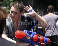 Pictures of Songkran 2012, taken on Friday, 13 April 2012, on Silom Road in Bangkok.