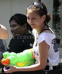 Pictures of Songkran 2012, taken on Friday, 13 April 2012, on Silom Road in Bangkok.