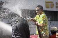 Pictures of Songkran 2012, taken on Friday, 13 April 2012, on Silom Road in Bangkok.