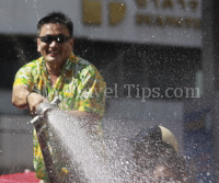 Pictures of Songkran 2012, taken on Friday, 13 April 2012, on Silom Road in Bangkok.