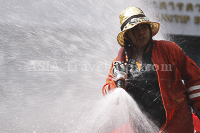 Songkran takes place during one of the hottest times of the year. Getting wet is part of the fun.