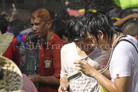 Pictures of Songkran 2012, taken on Friday, 13 April 2012, on Silom Road in Bangkok.