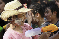 Pictures of Songkran 2012, taken on Friday, 13 April 2012, on Silom Road in Bangkok.