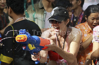 Pictures of Songkran 2012, taken on Friday, 13 April 2012, on Silom Road in Bangkok.