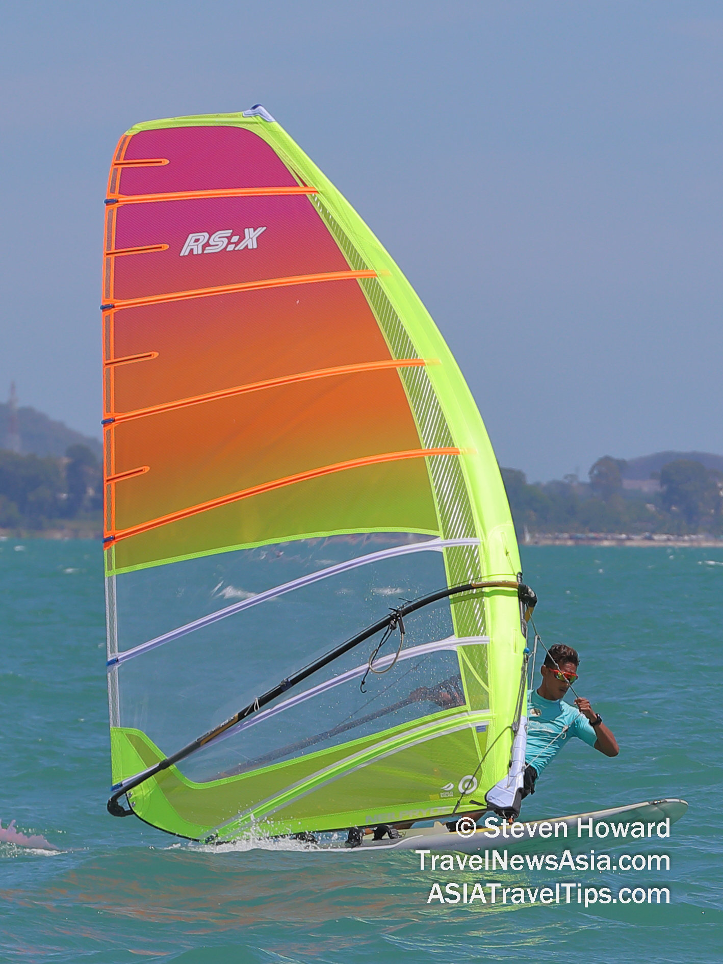 Into the second day of racing for the RS:X and RS:One windsurf classes and a pattern is emerging. Ahmad Denish Bin Aboul Hadi Kane dominated in the RS:X today with three wins from four races, while GLH Cheow Lin had to settle for a string of seconds ahead of Nuur Fatin Sulghah Neinti Abdyl Ravman who sits third overall. Picture by Steven Howard of TravelNewsAsia.com Click to enlarge.