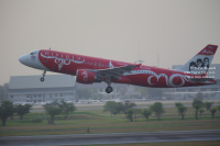 Thai AirAsia taking off from Don Mueang Airport in Bangkok, Thailand
