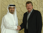 DWTC Director General, Mubarak bin Fahad shaking hands with Ian Fairservice, Motivate Publishing's Managing Partner and Group Editor