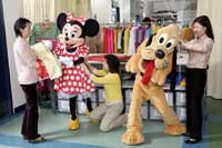 Minnie Mouse and Pluto Measure Up for Chinese New Year