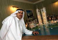 Reem Investments CEO Ibrahim Belselah with a model of Najmat Abu Dhabi