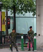 Soldiers stationed at the Erawan junction in Bangkok 20/9/06 - click for larger image