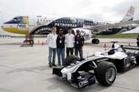 Nico Rosberg and Kazuki Nakajima attend AirAsia's unveling of aircraft in AT&T Williams Formula One teams livery - click to enlarge (opens in a new window)