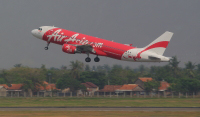 AirAsia Indonesia Airbus A320-216 reg: PK-AXI taking off from Jakarta Airport on 14 November 2015.