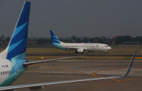 Garuda Indonesia aircraft at Jakarta Airport.