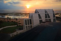 Sunrise from a luxurious Sky Villa at The Ritz-Carlton, Bali. The white building in the shot is the all-suite hotel's wedding chapel!