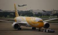 Scoot Boeing 787 Dreamliner registration 9V-OFA at Don Mueang International Airport in Bangkok, Thailand.