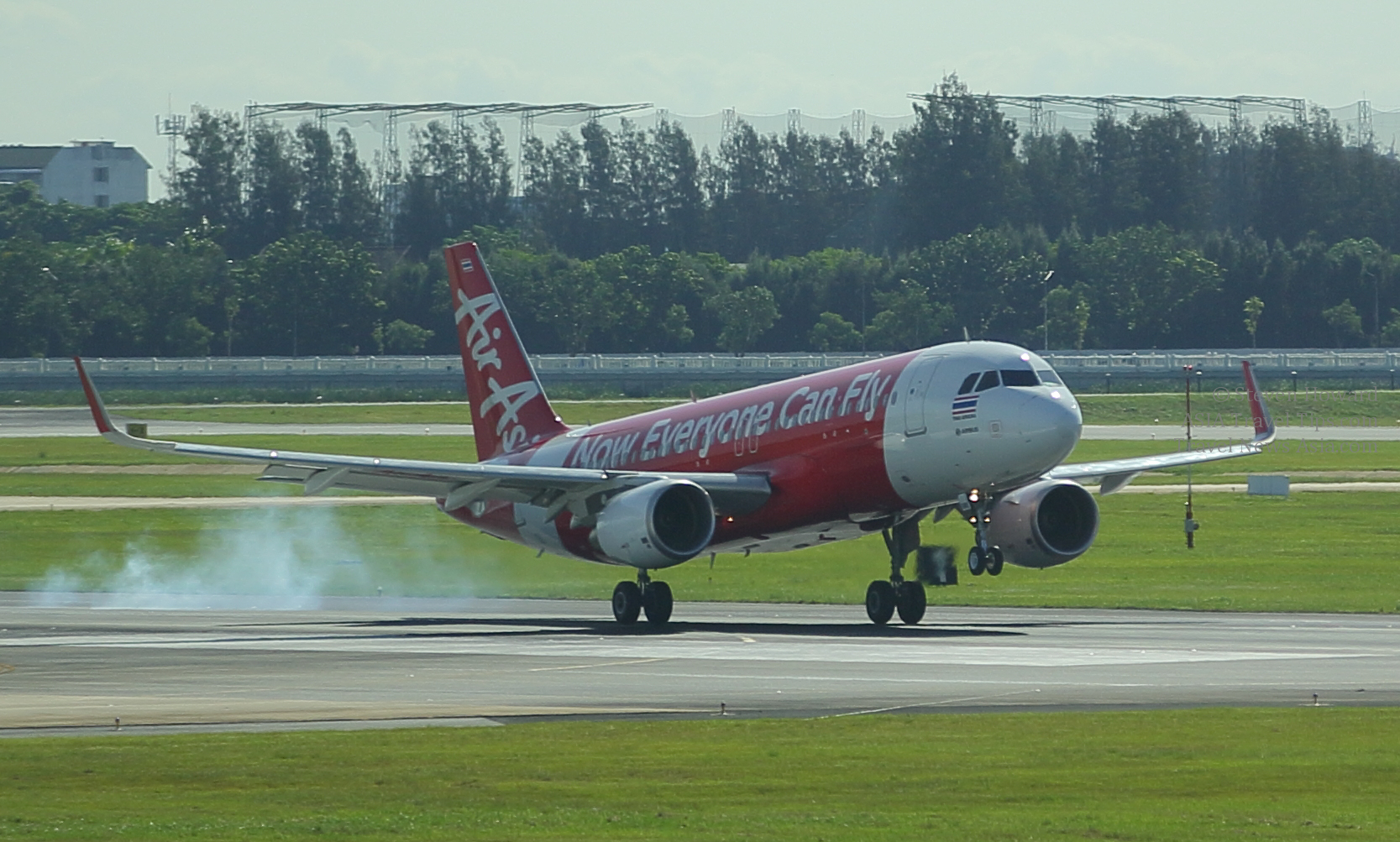 Thai AirAsia A320 landing at Don Mueang International Airport in Bangkok, Thailand