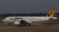 Tigerair Airbus A320 reg: 9V-TAT at Soekarno–Hatta International Airport in Jakarta, Indonesia (14 November 2015).