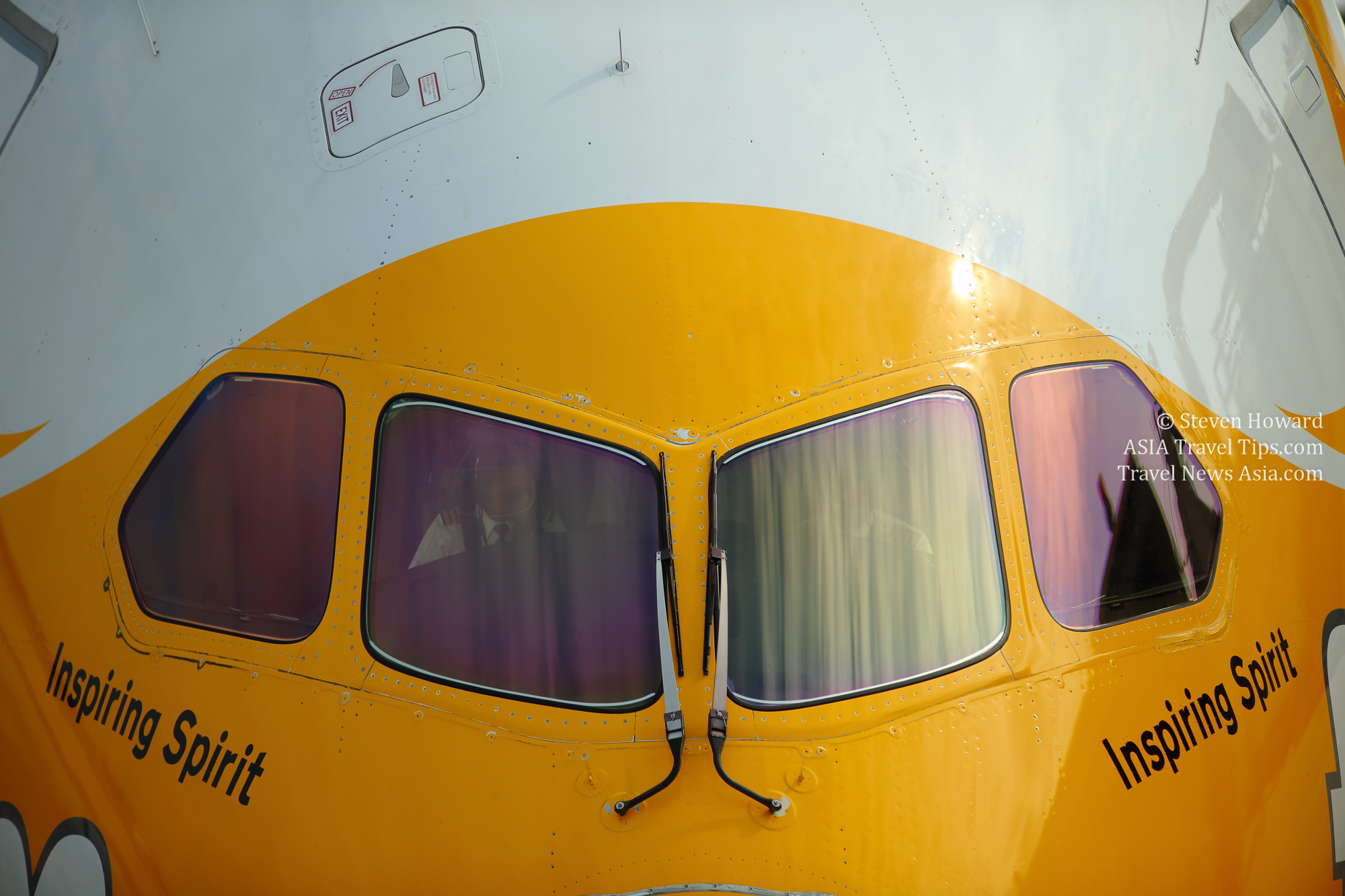 Pilots in a Scoot Boeing 787 Dreamliner getting ready for departure from Don Mueang Airport in Bangkok, Thailand in 2017. Click to enlarge.