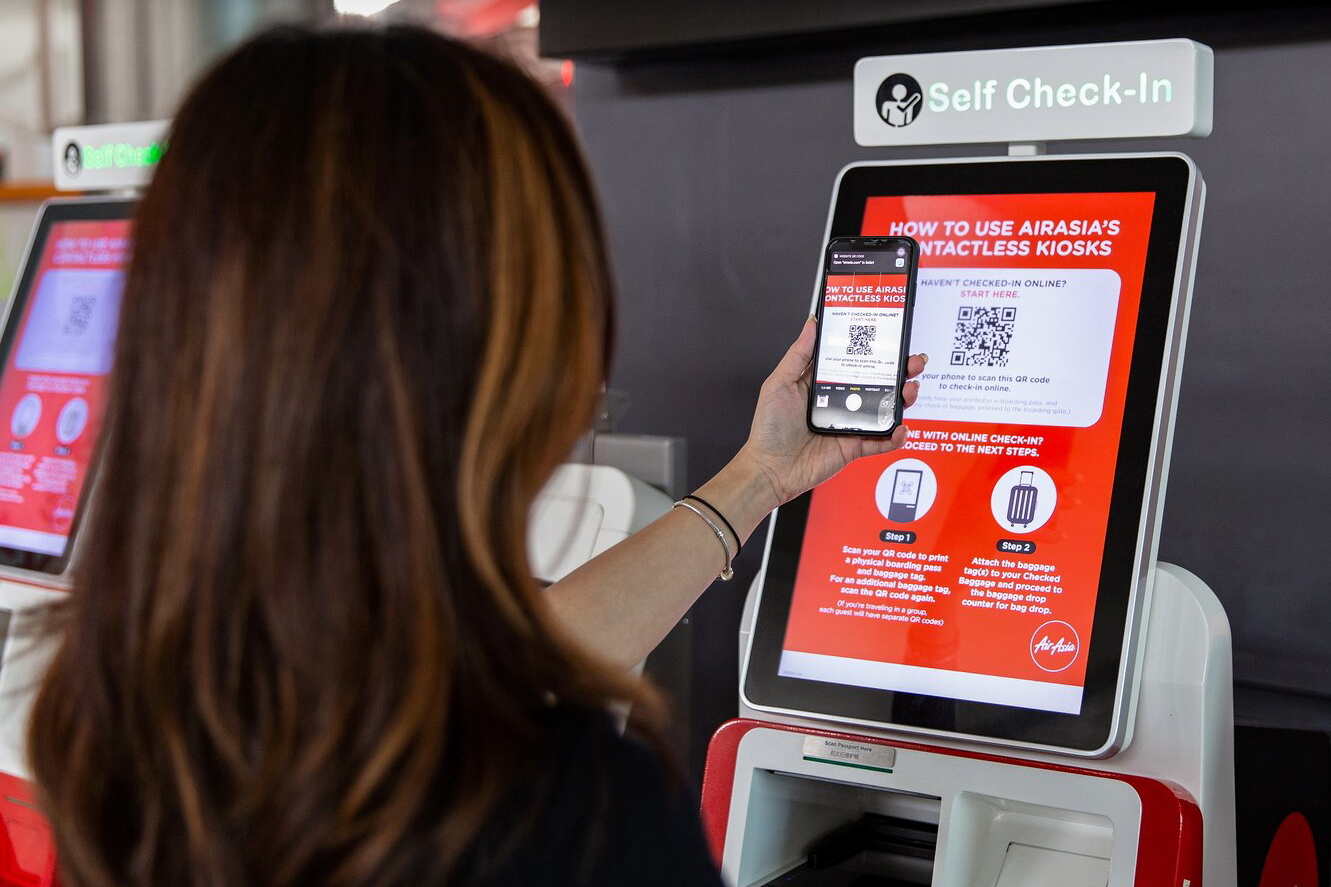 AirAsia recommends passengers to check-in online via its website, mobile app or kiosks and to use its QR Code system for contactless check-in and luggage loading. Click to enlarge.