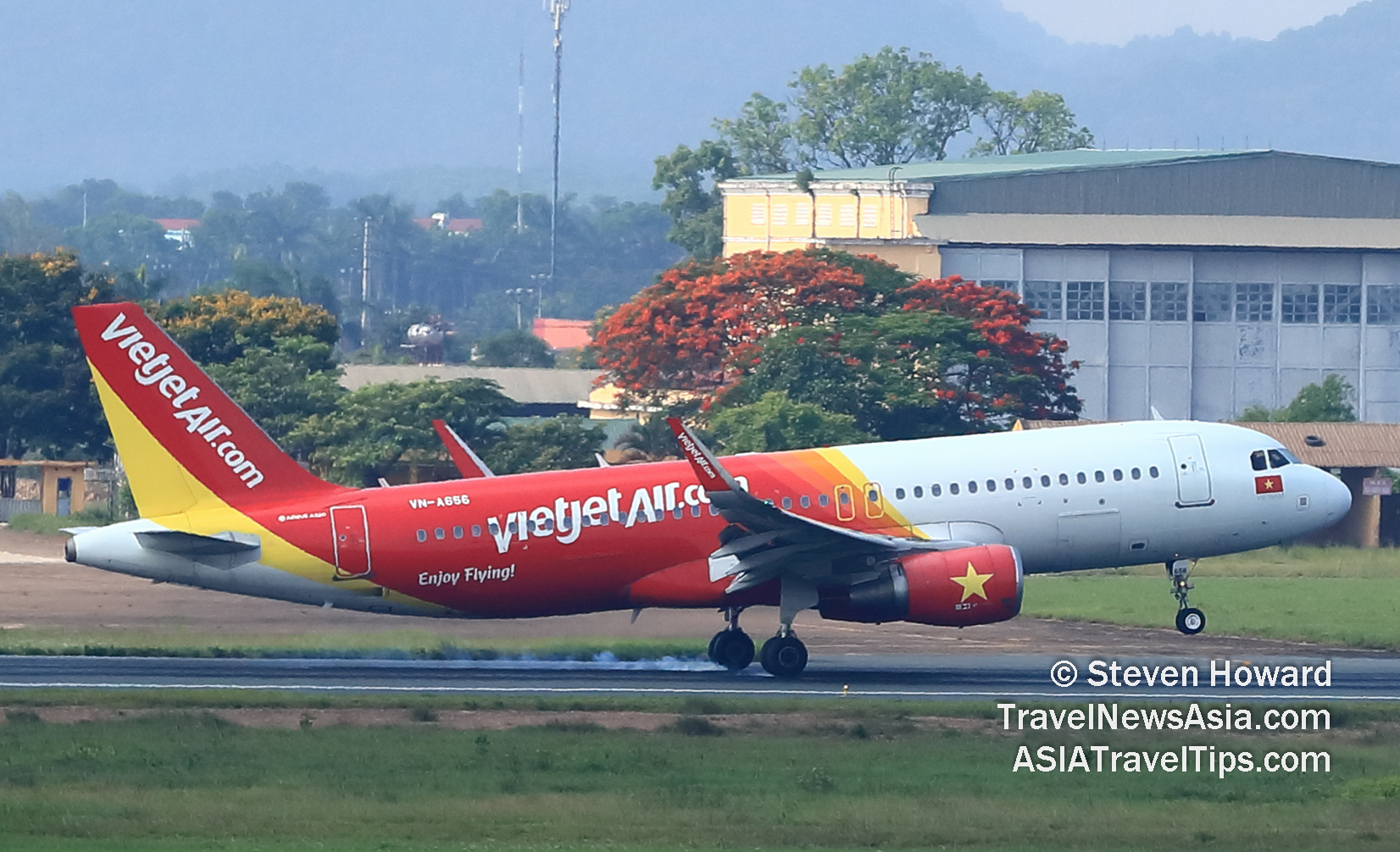 Vietjet A320 reg: VN-A656. Picture by Steven Howard of TravelNewsAsia.com Click to enlarge.