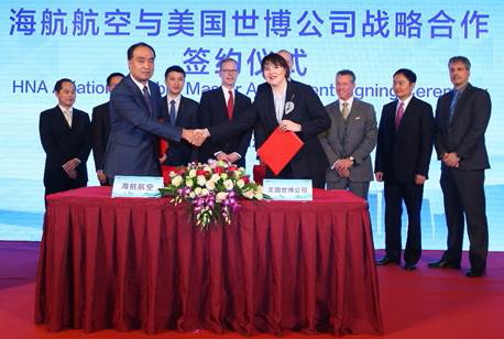 Dasha Kuksenko, Vice President and Regional General Manager APAC of Sabre signed the master agreement with He Haiyan, Information Technology Director of HNA Tourism Aviation Investment Holding Group, with Mediators at the back, from left to right are Zhang Wei, Wu Zhidian and Xie Haoming from HNA; Scott Shaw and Steve Winkates from US Embassy; Greg Gilchrist, Peter Wu and Henning Bruns from Sabre.