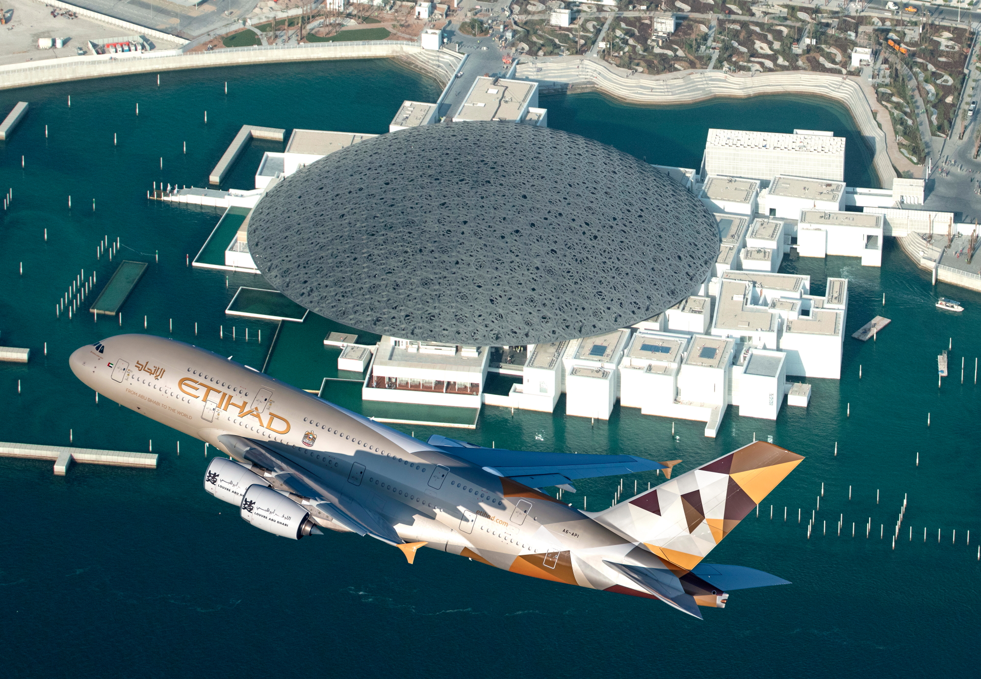 Etihad Airways celebrates opening of Louvre Abu Dhabi with Airbus A380 fly-by. Click to enlarge.