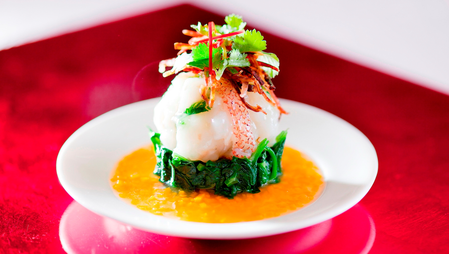 Hoi King Heen - Steamed Spotted Garoupa Fish Ball with Pumpkin Sauce