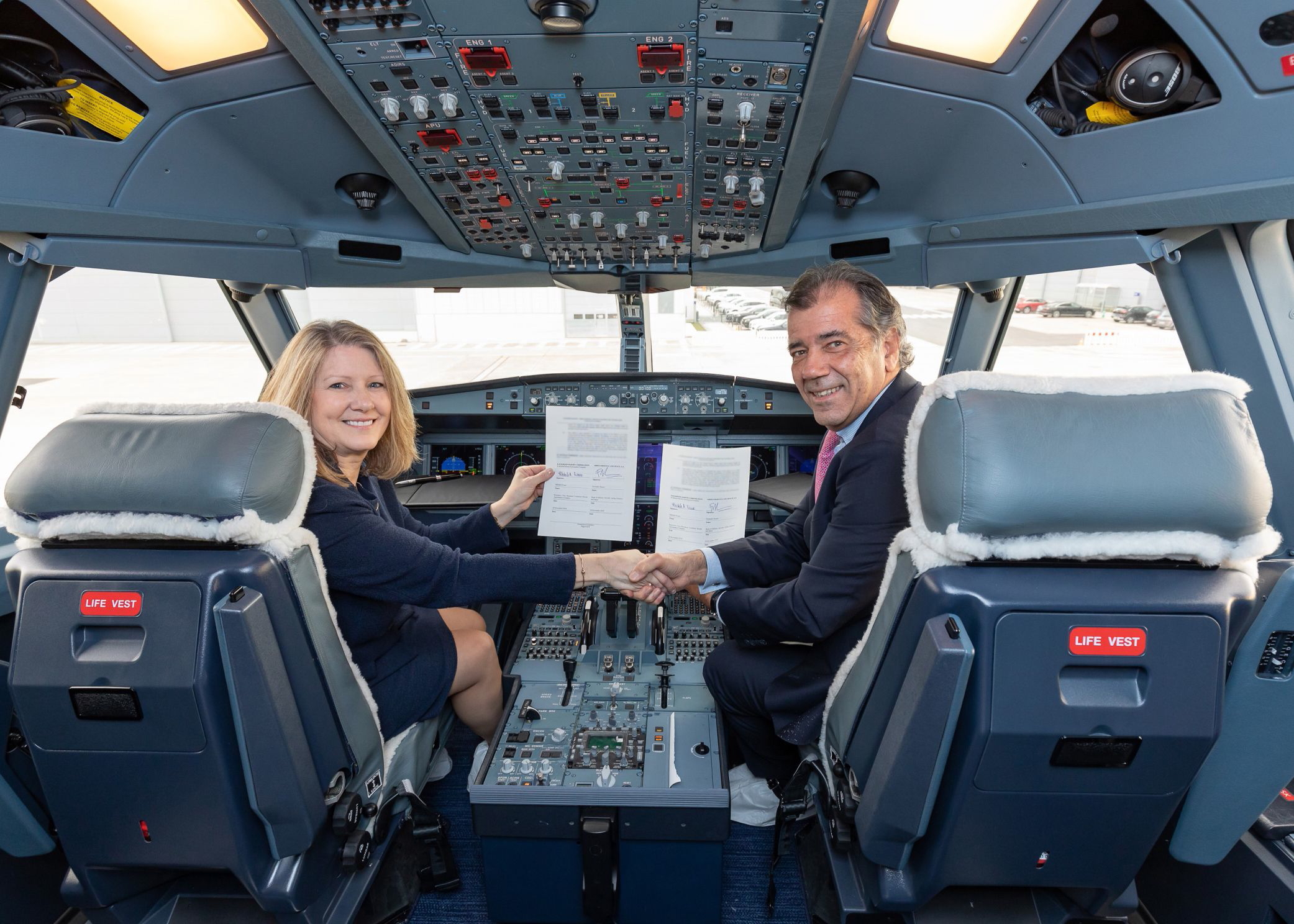 Michele Evans, Executive Vice President, Lockheed Martin Aeronautics, with Airbus Defence and Space Head of Military Aircraft, Fernando Alonso, in the cockpit of an Airbus A330 Multi Role Tanker Transport (A330 MRTT). Click to enlarge.