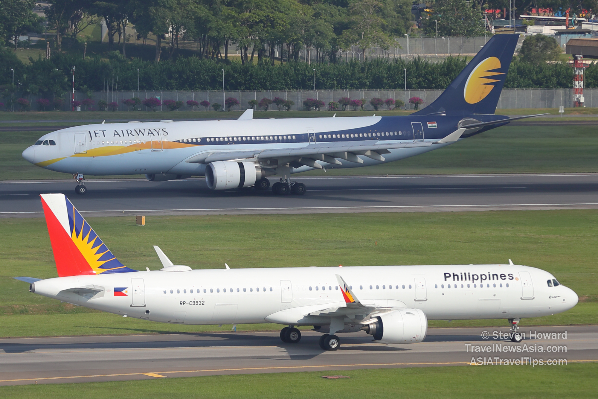 Jet Airways and Philippine Airlines at Changi Airport in Singapore. Picture by Steven Howard of TravelNewsAsia.com Click to enlarge.