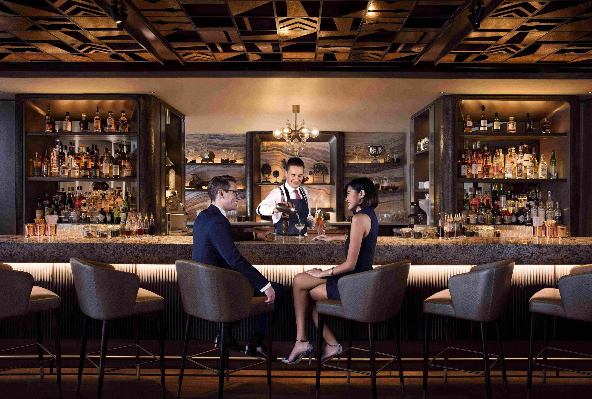 The Mandarin Oriental, Singapore has opened a new bar, the MO Bar. The result of a collaboration with bar developer, Proof & Company, MO Bar is located on the hotel’s fourth floor with floor-to-ceiling views of Marina Bay. Click to enlarge.